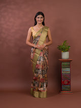 A saree with a kalamkari style pattern in green colors, with zari weaving and a Banarasi border. under 1000