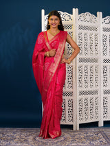 A pink and gold Upada silk saree with Bandhani style embellishments and Zari work,