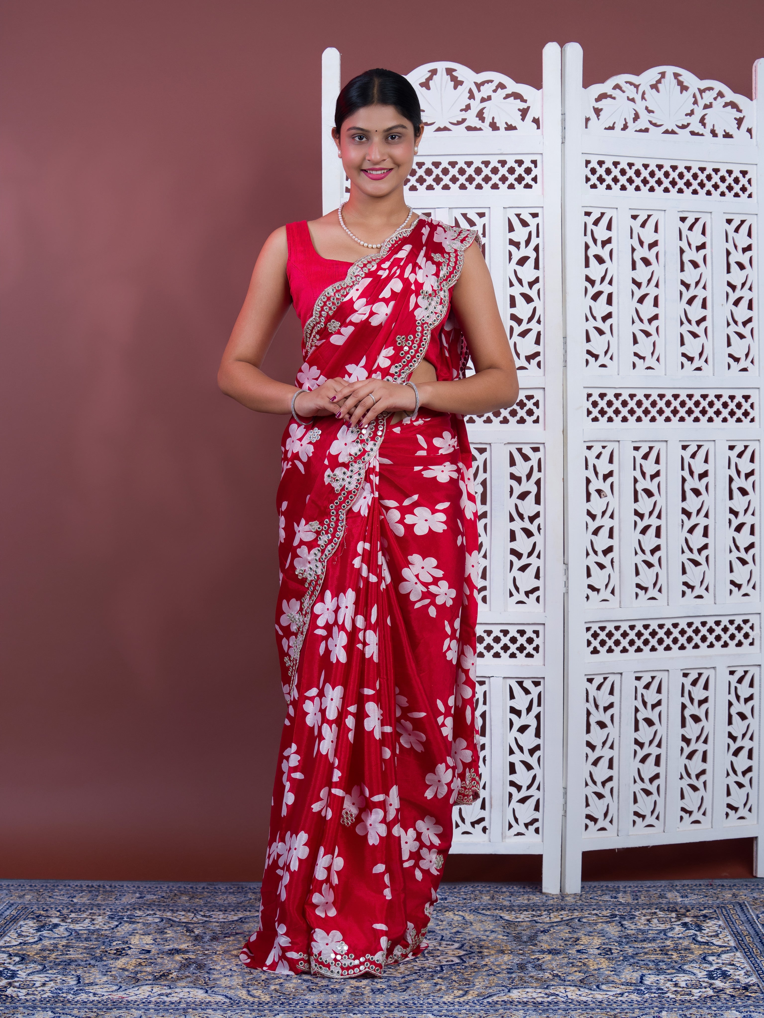 A red saree with white pattern Printed Crepe Silk with Embroidered Mirror Work