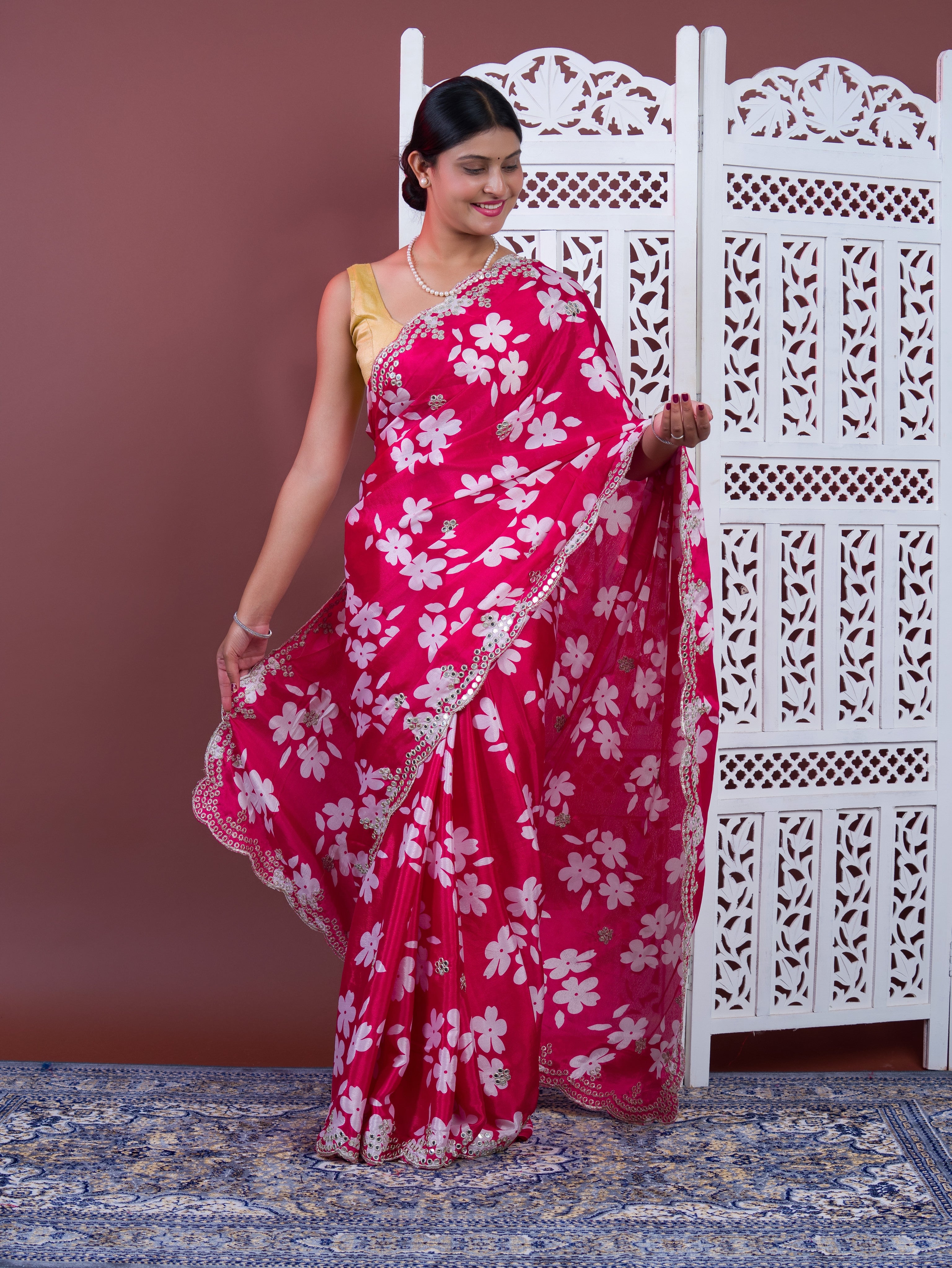 A pink floral saree with white pattern Printed Crepe Silk with Embroidered Mirror Work