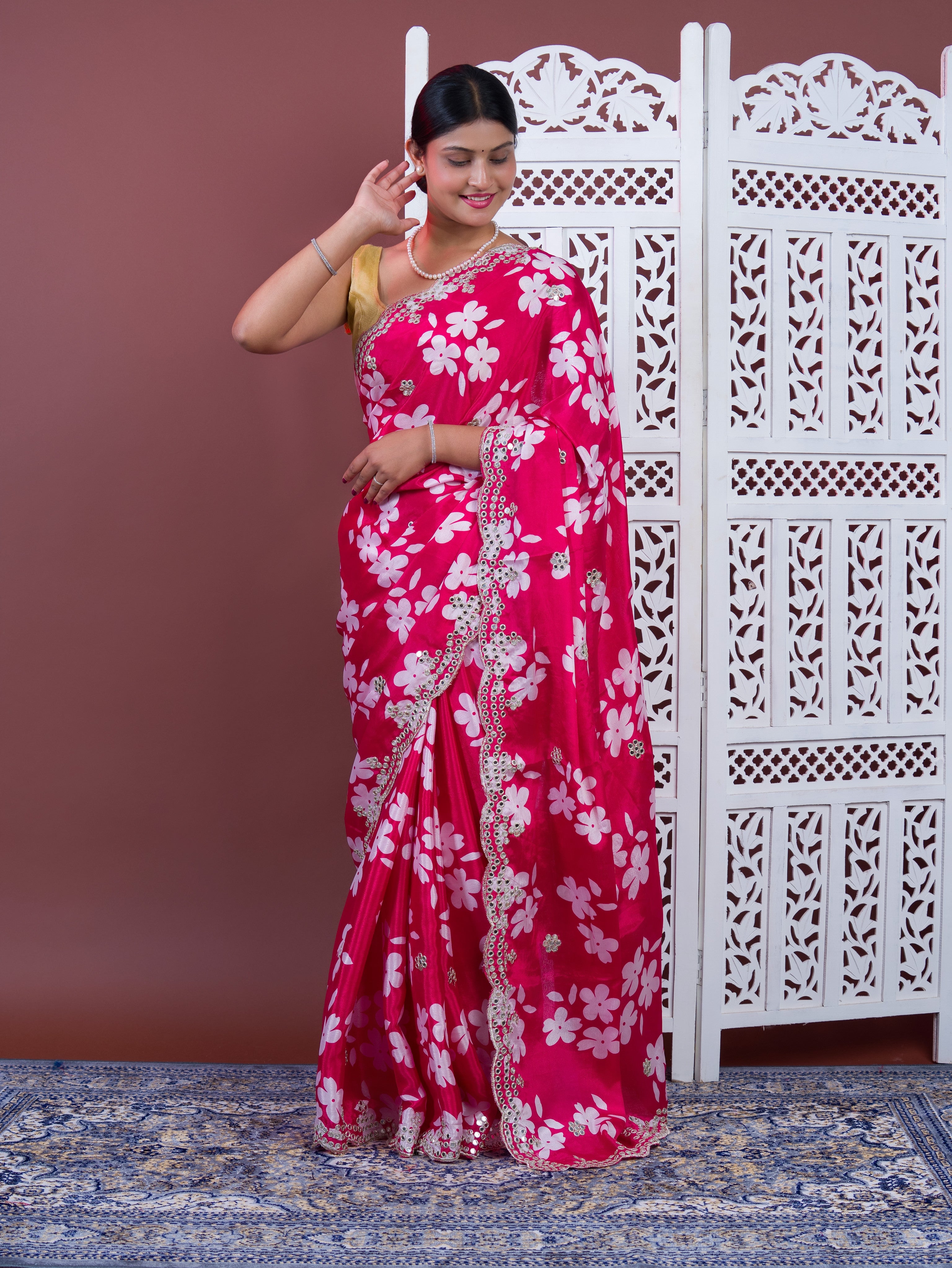 A pink floral saree with white pattern Printed Crepe Silk with Embroidered Mirror Work