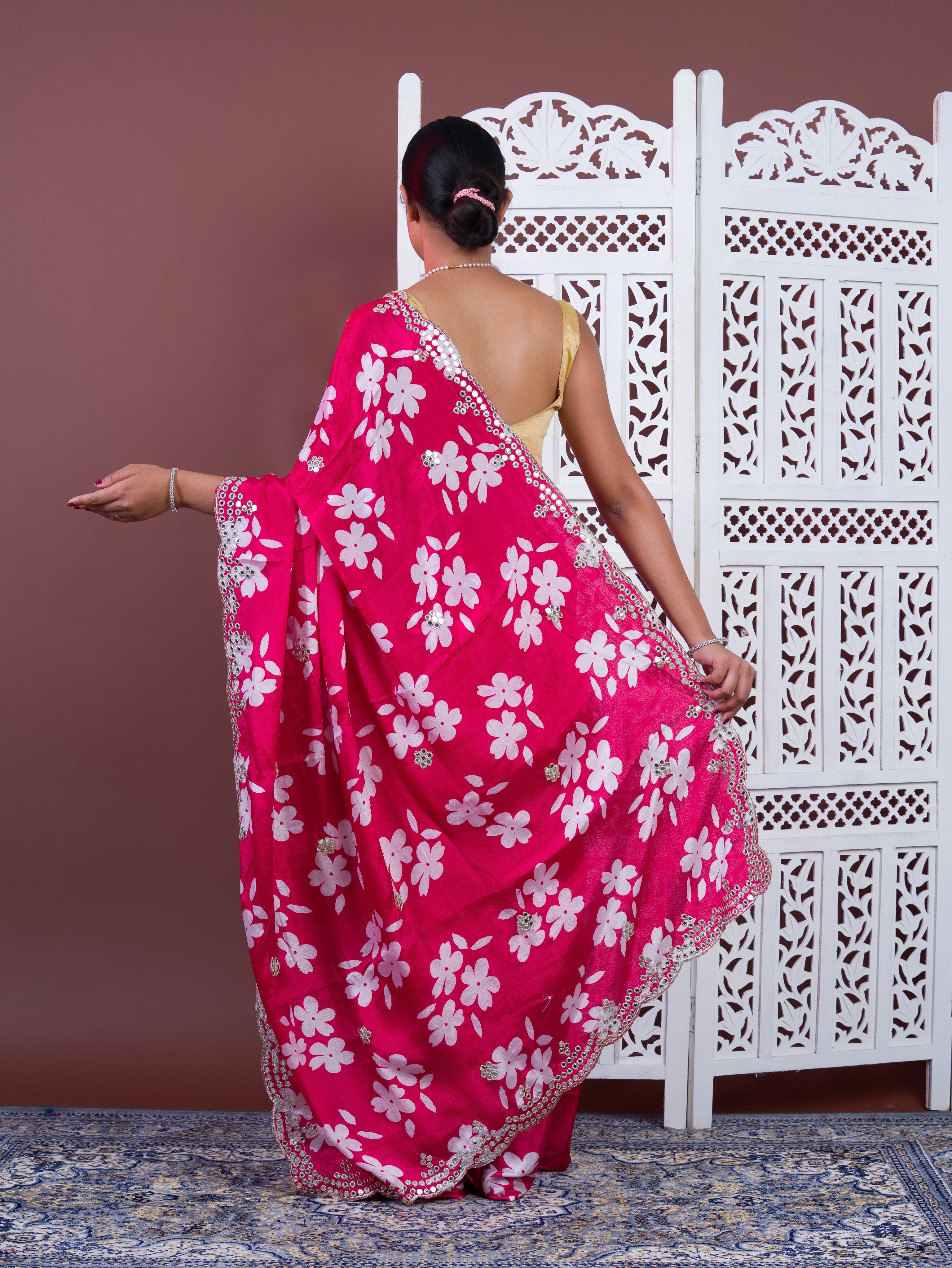 A pink floral saree with white pattern Printed Crepe Silk with Embroidered Mirror Work