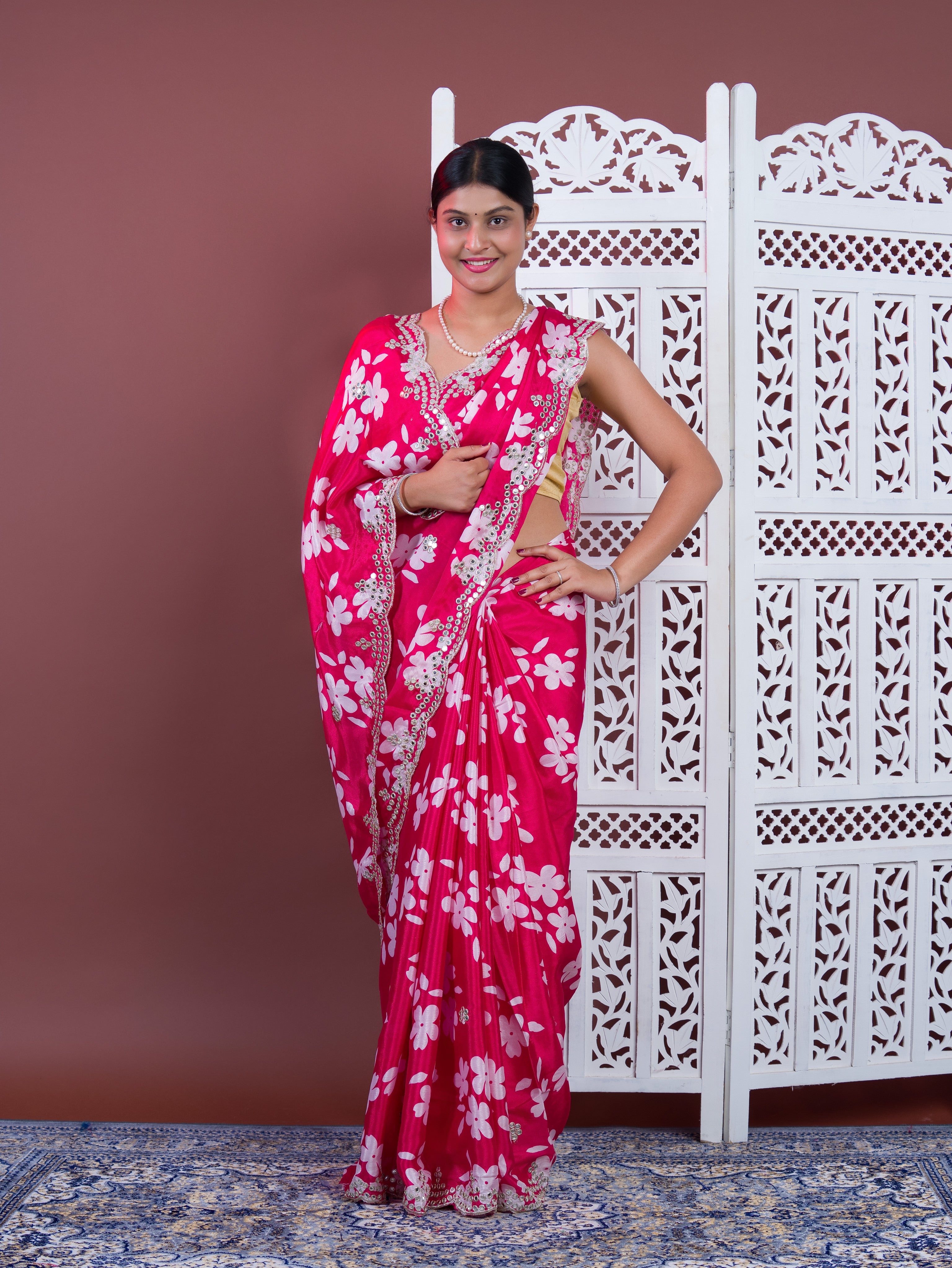A pink floral saree with white pattern Printed Crepe Silk with Embroidered Mirror Work