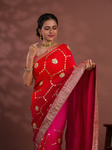 A pink and orange saree with Gota Patti Work