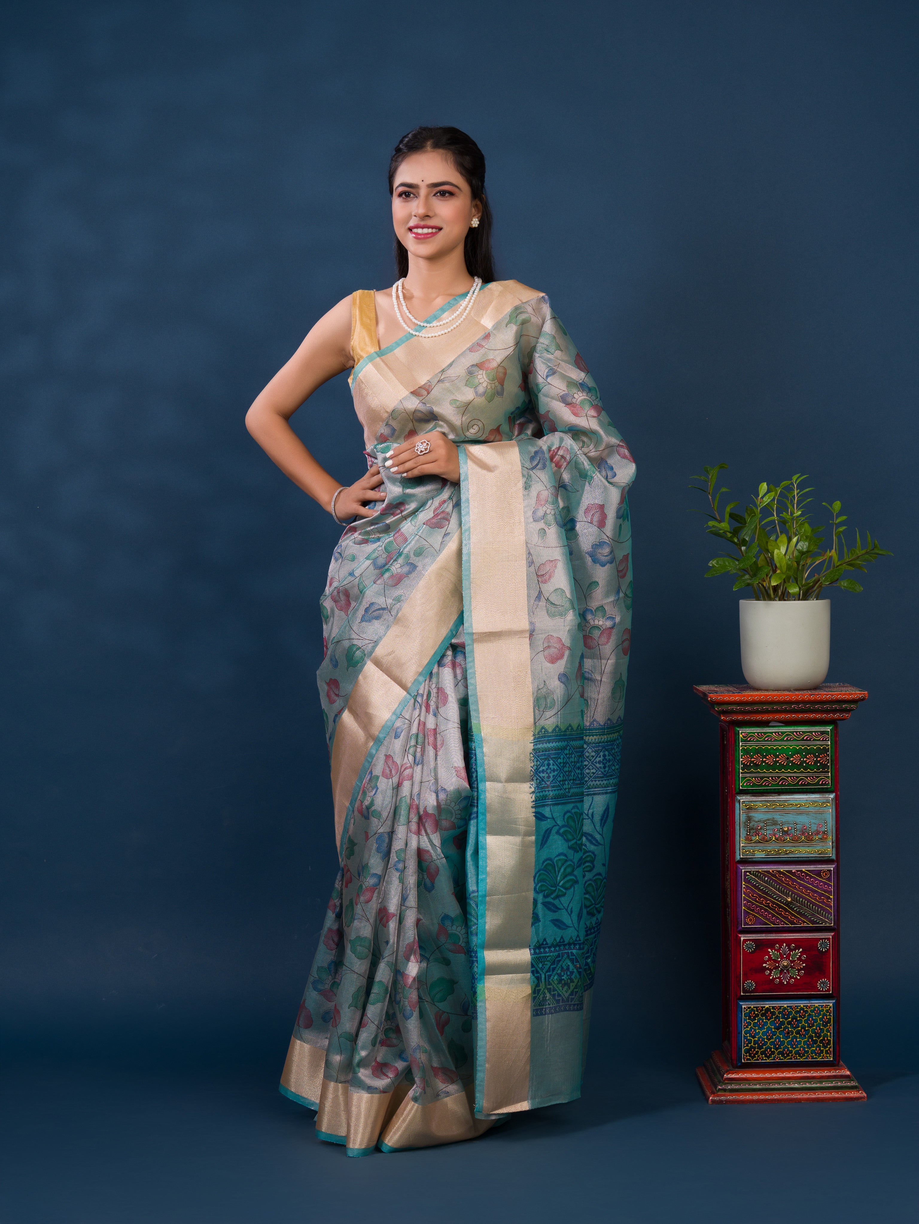 A traditional saree with Cotton Silk Printed With Zari border .