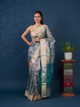 A traditional saree with Cotton Silk Printed With Zari border .
