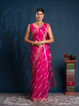 Pink saree with gold patternsOrganza Leheriya Style With Gotapatti Work