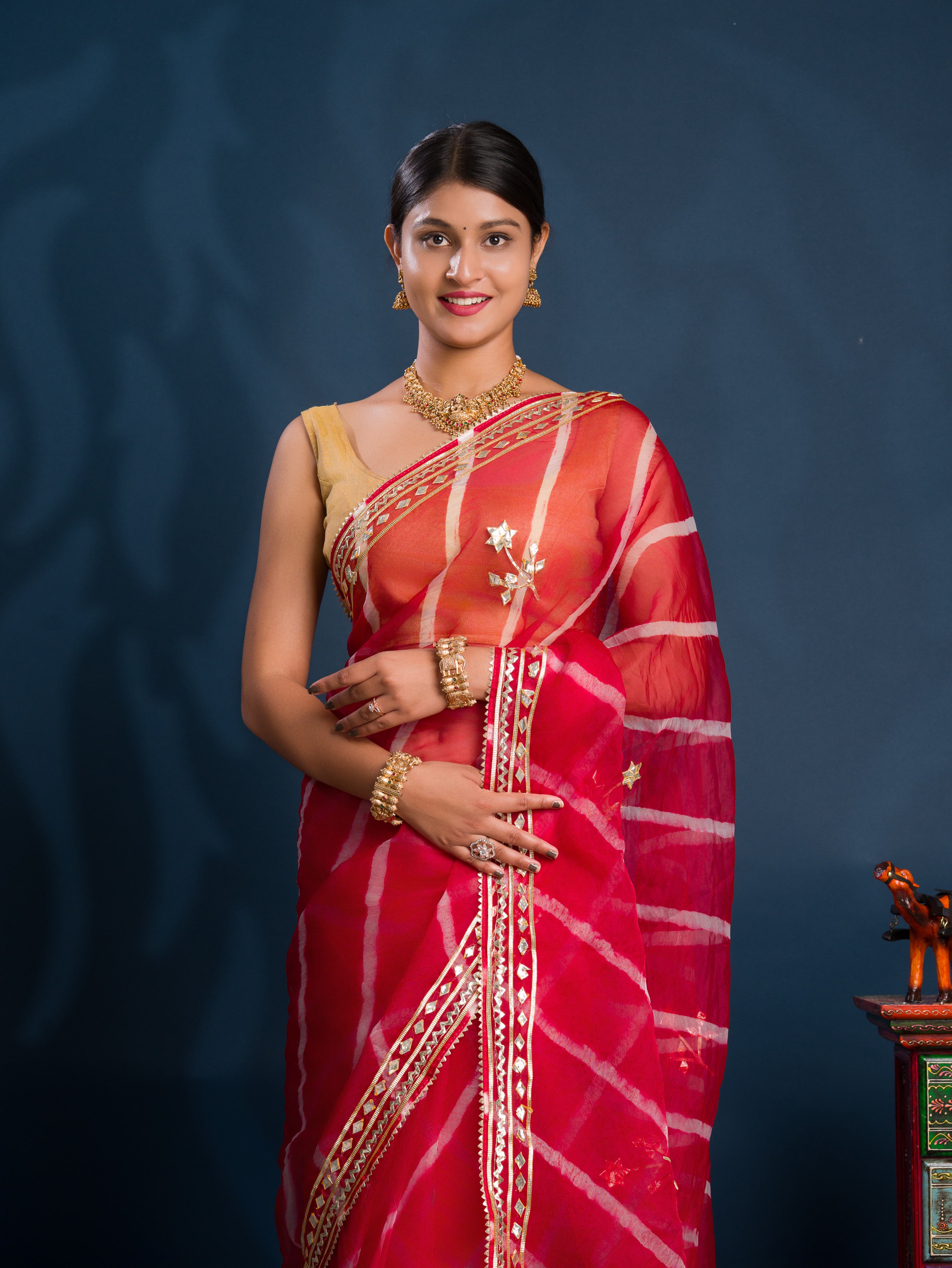 Red saree with gold patterns Organza Leheriya Style With Gotapatti Work