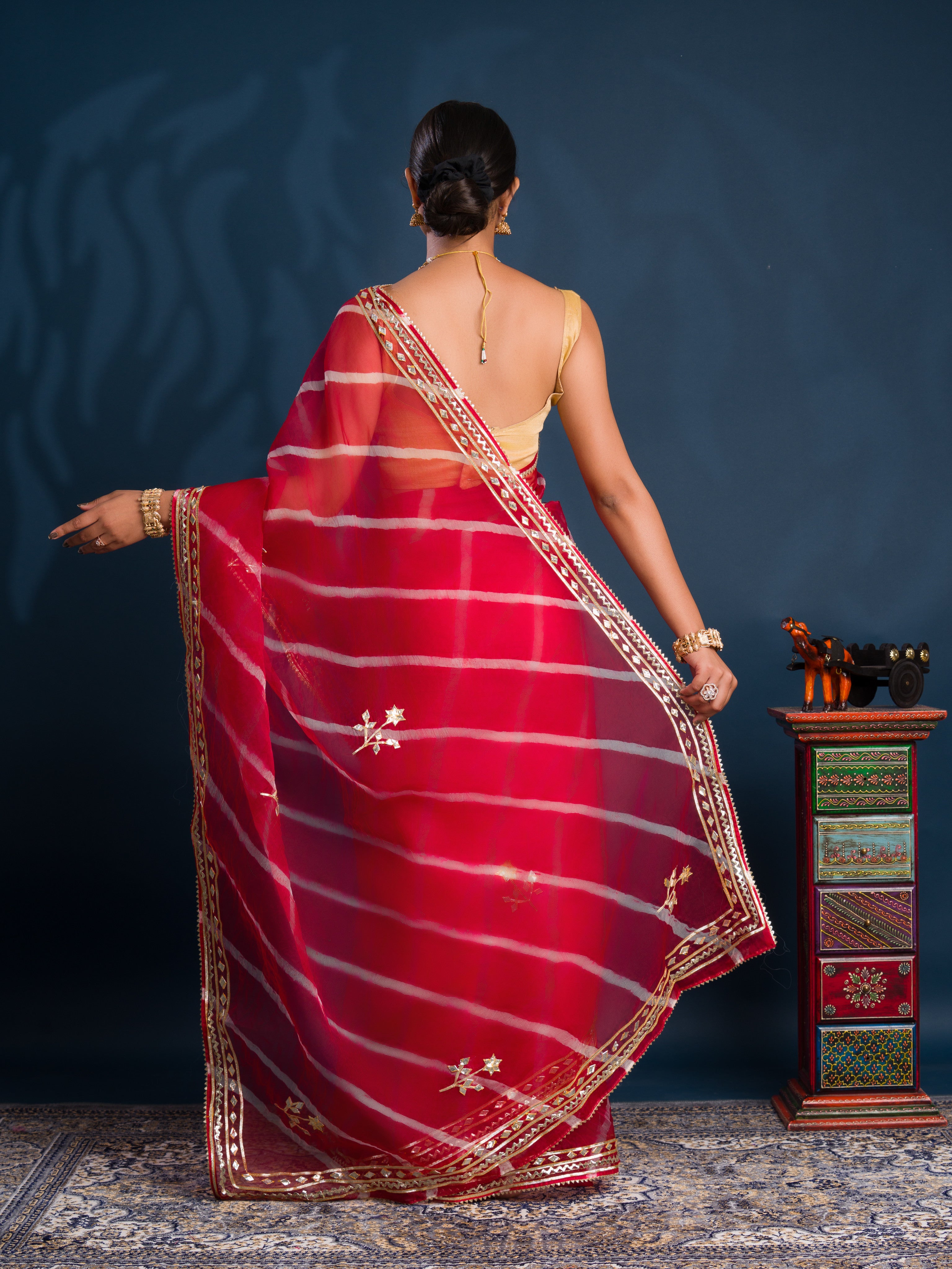 Red saree with gold patterns Organza Leheriya Style With Gotapatti Work