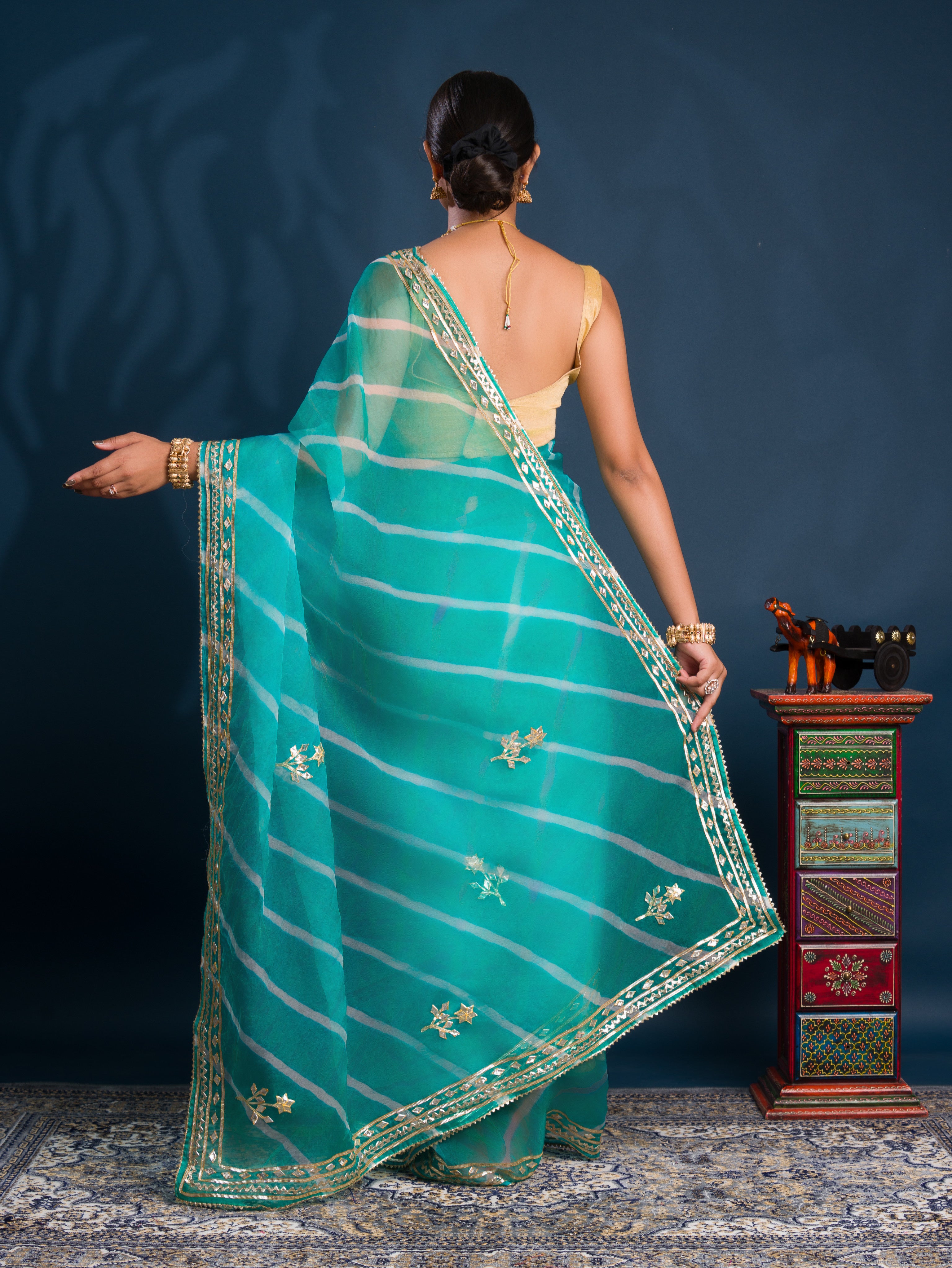 Teal sareewith Silverpatterns Organza Leheriya Style With Gotapatti Work
