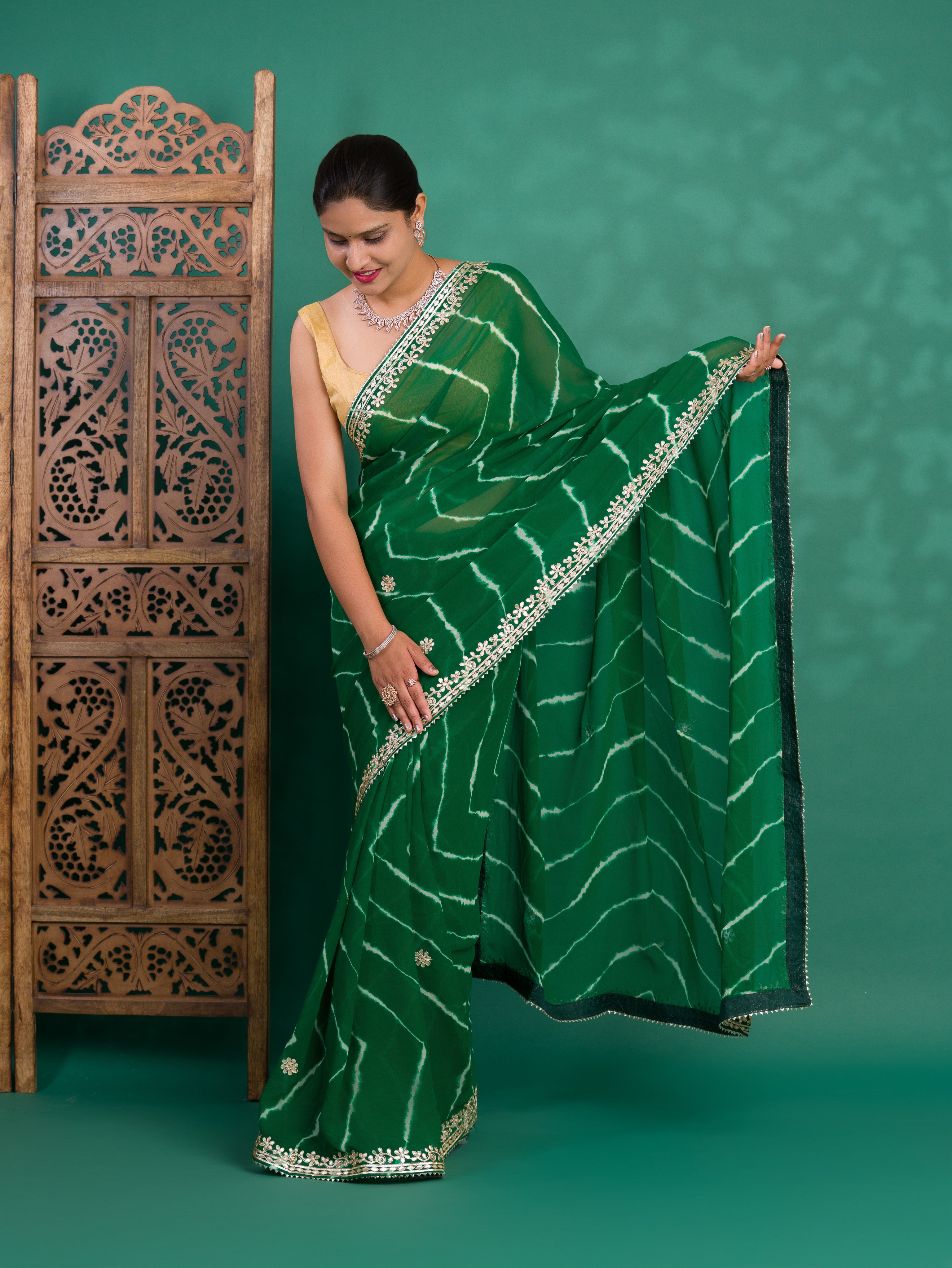 Chiffon Leheriya Style Wih Gotapatti Work Saree in green colour
