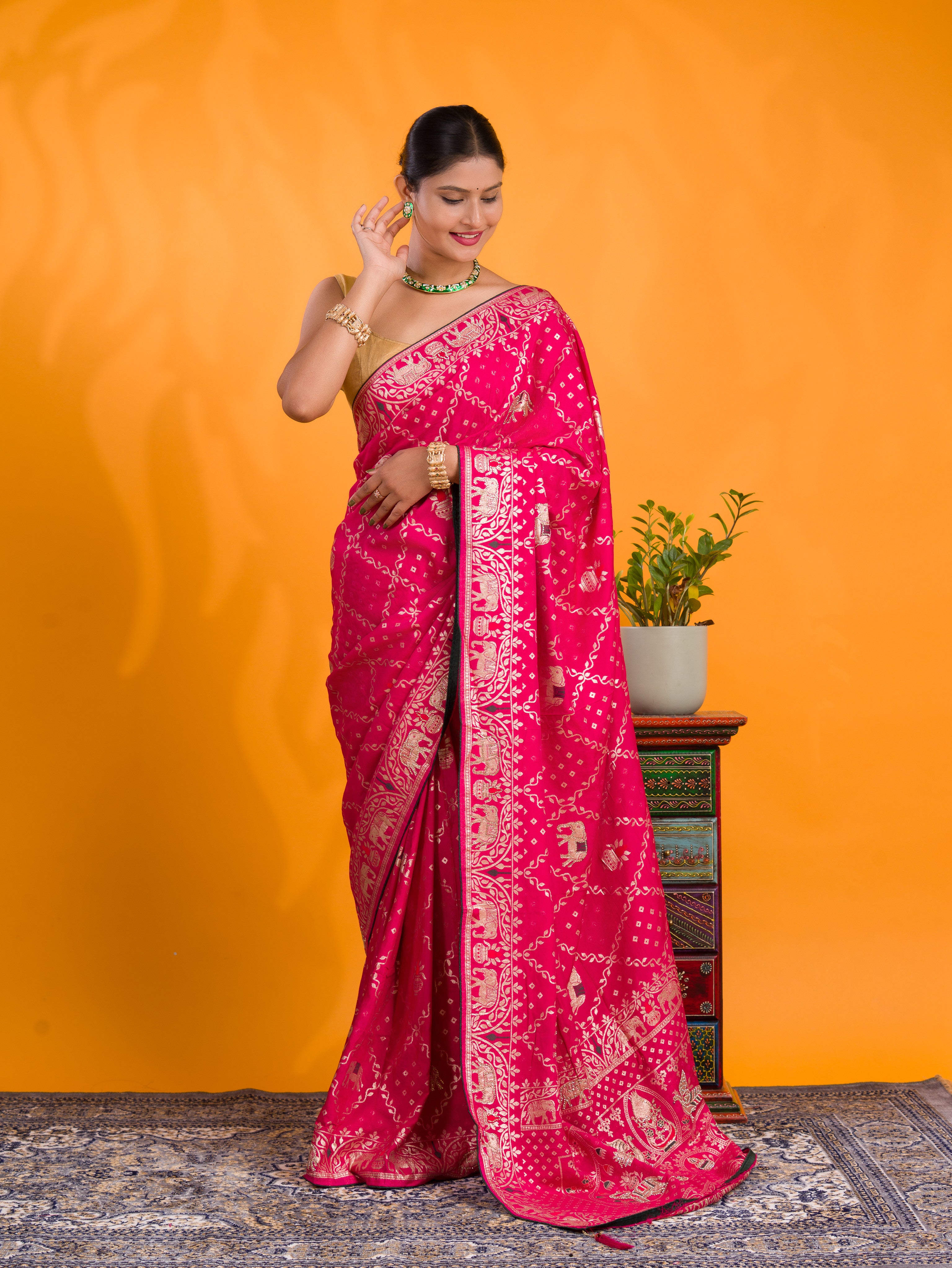 A traditional Dola Silk Banarasi Style With Stone Work Saree in pink colour