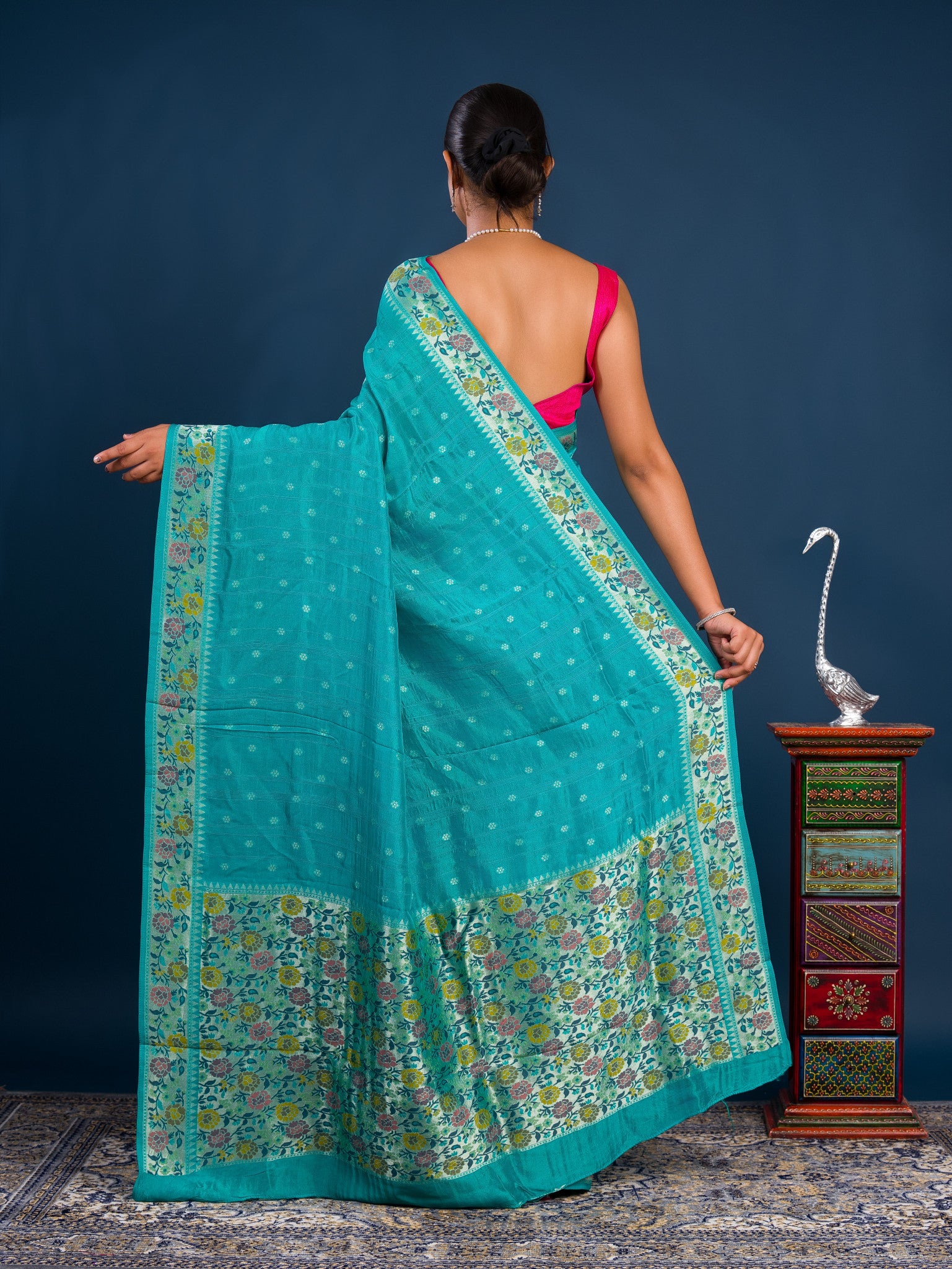 A teal saree with floral patternsBanarasi Silk Printed Style With zari weaving Work Saree