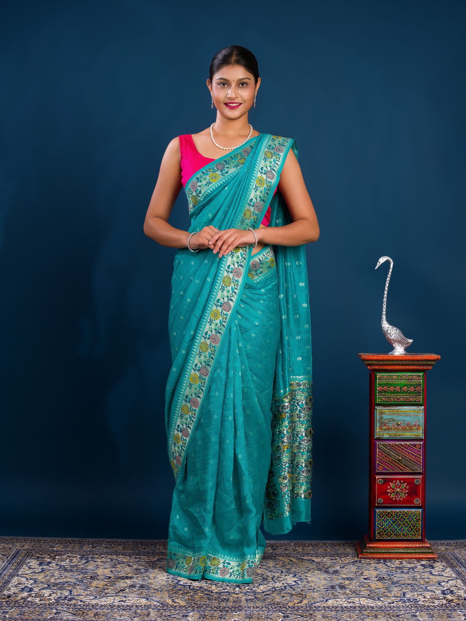 A teal saree with floral patternsBanarasi Silk Printed Style With zari weaving Work Saree