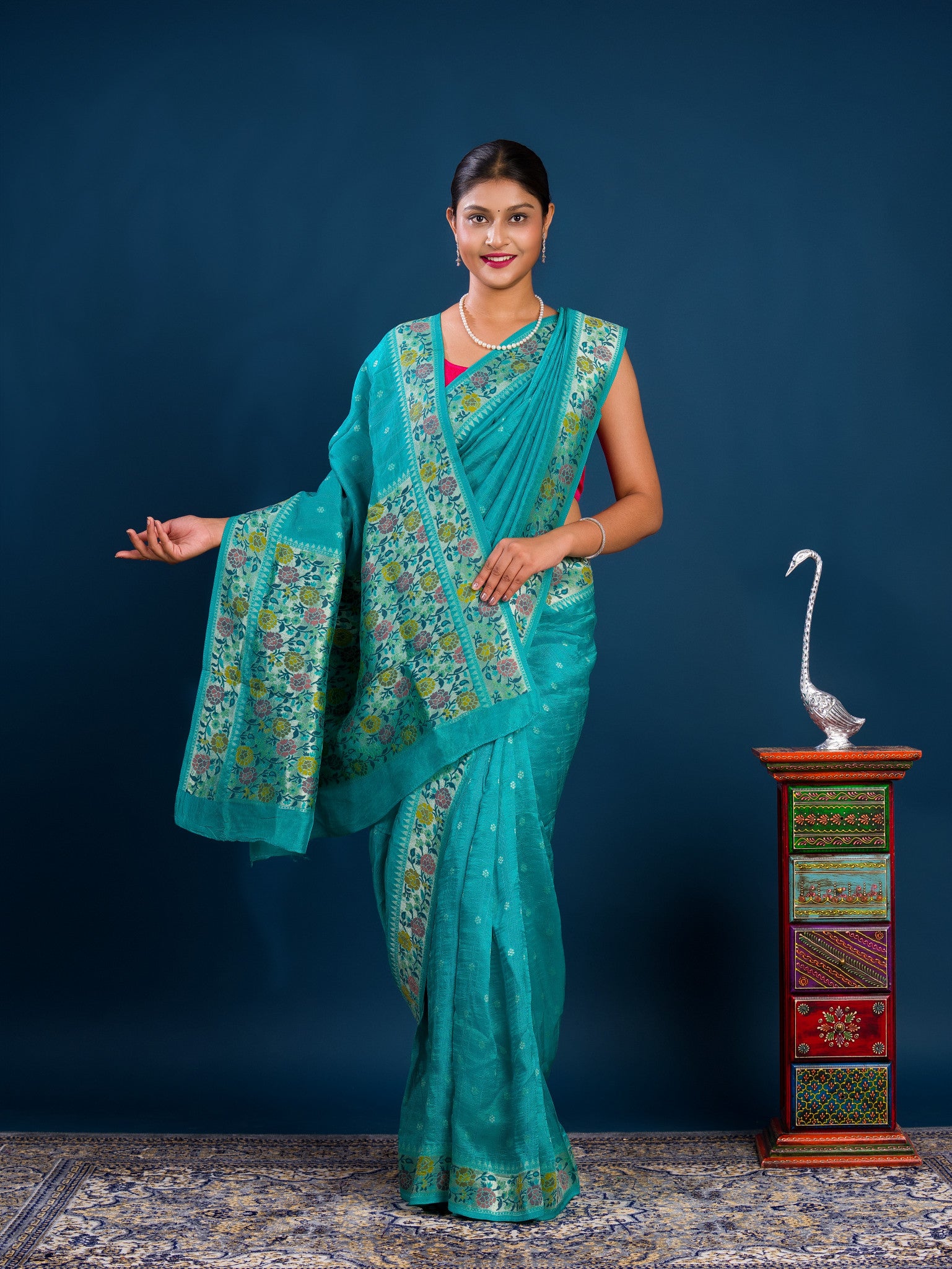 A teal saree with floral patternsBanarasi Silk Printed Style With zari weaving Work Saree