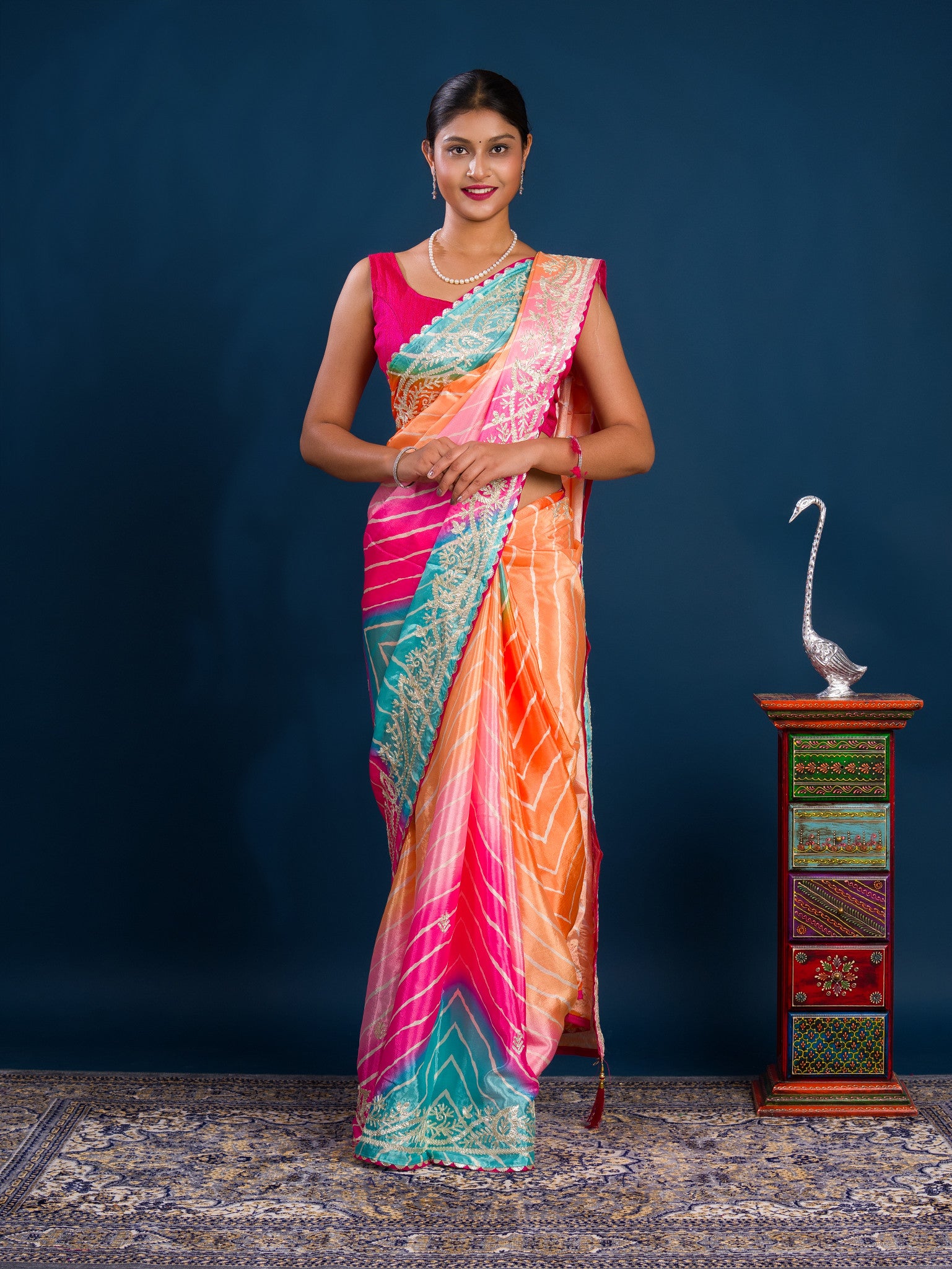Acolorful saree in leheriya style