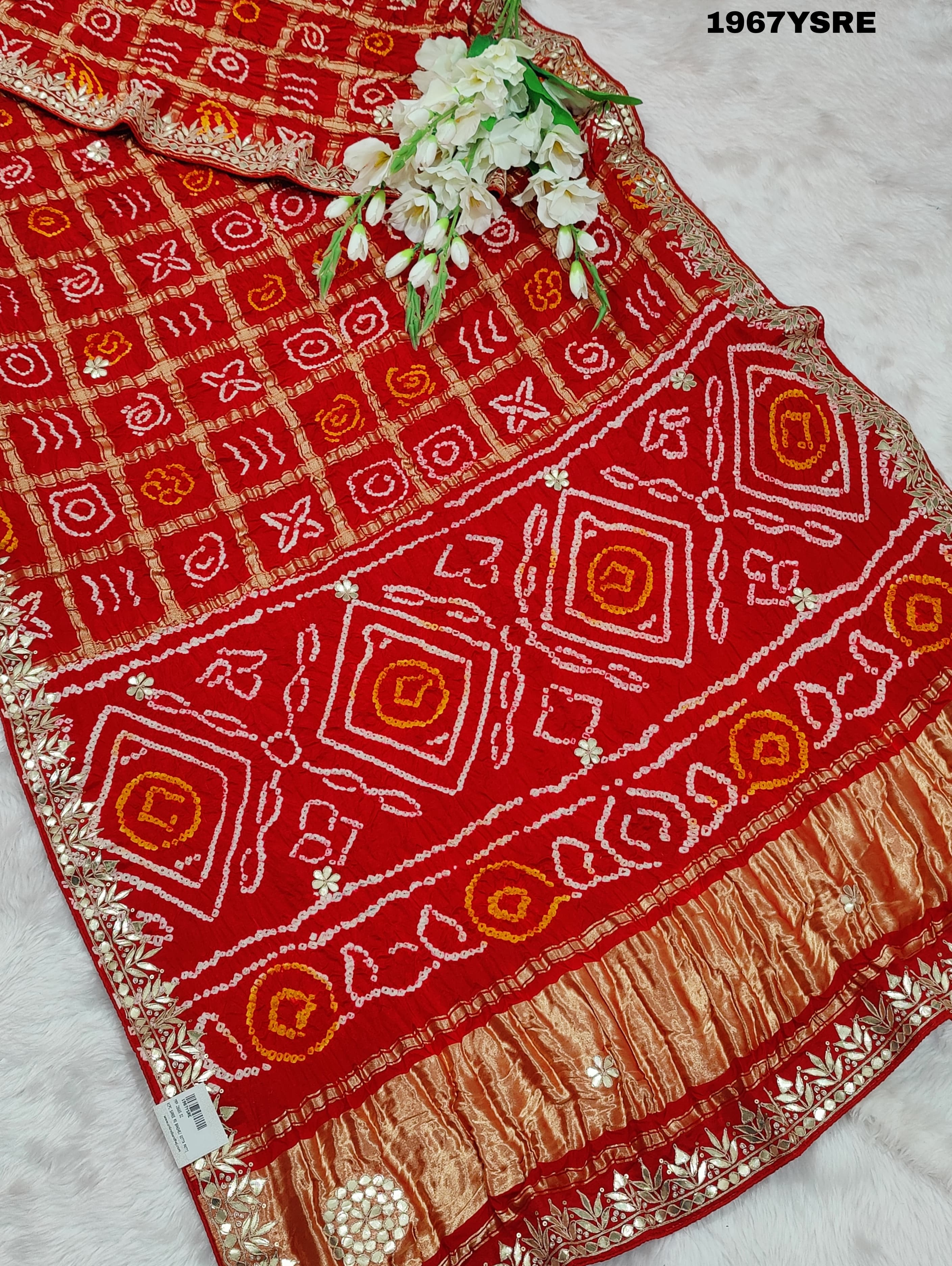 A red Gaji silk Bandhani saree Gota patti work