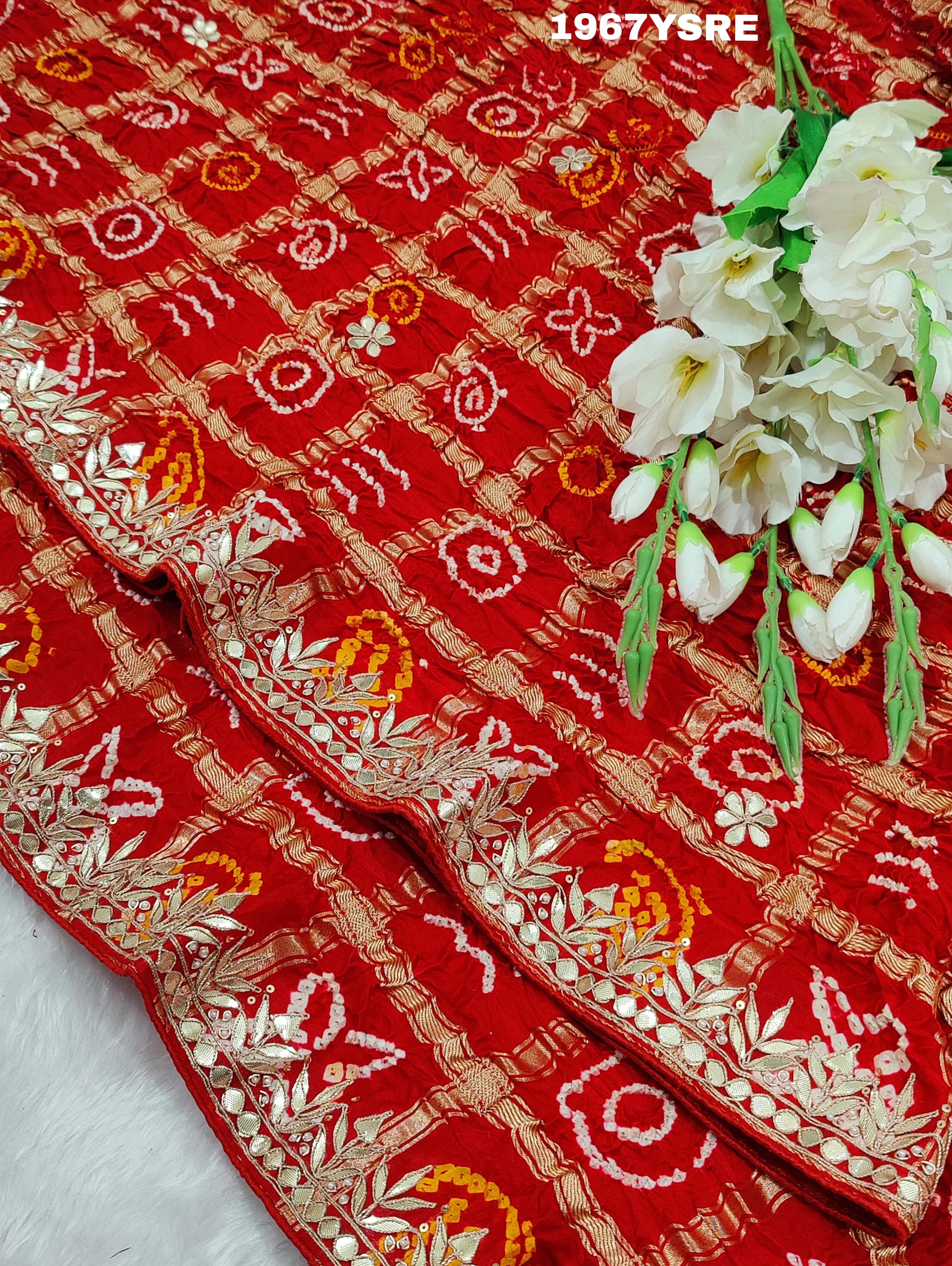 A red Gaji silk Bandhani saree Gota patti work