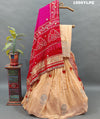 A traditional Indian lehanga with pure Gaji silk Jaipuri stylegotapatti work.