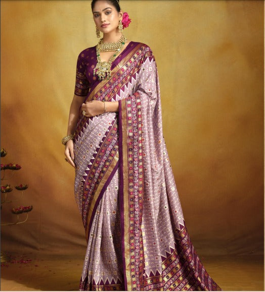 A purple and pink Banarasi silk saree