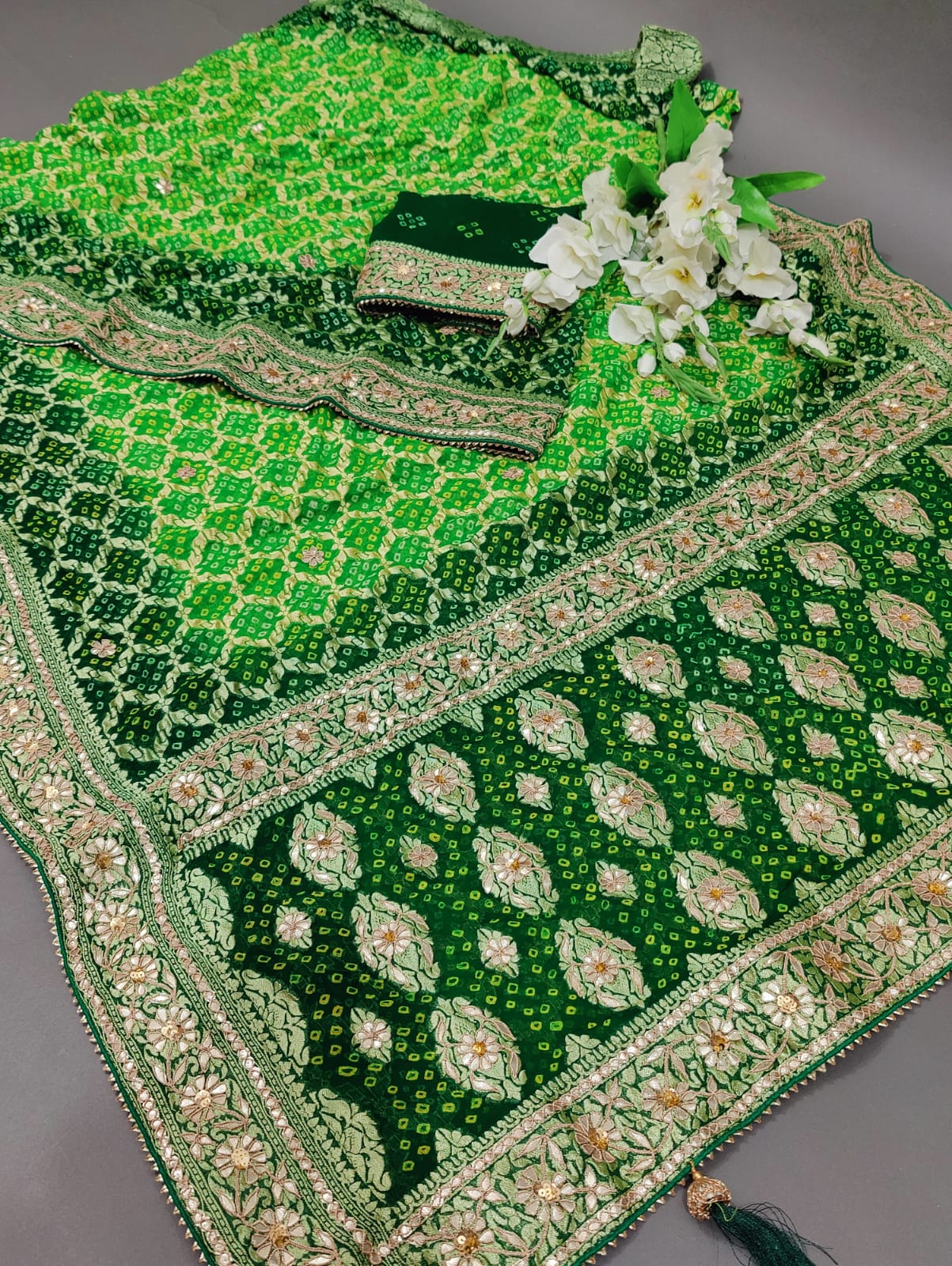khadi Georgette cutdana Gota patti Handwork Bandhani saree in green colour