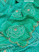 A green modal silk bandhani saree with pitan gotapatti work