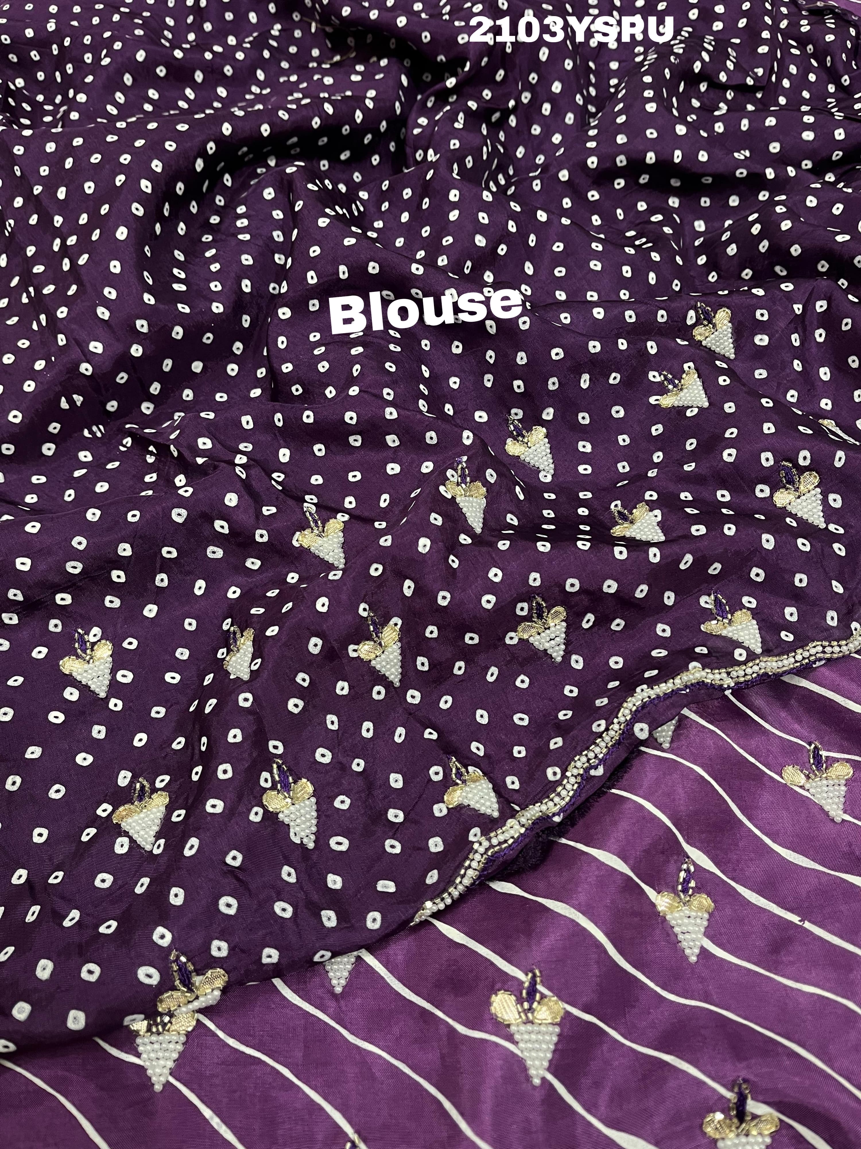 A purple dola silk saree with pearl gotapatti work