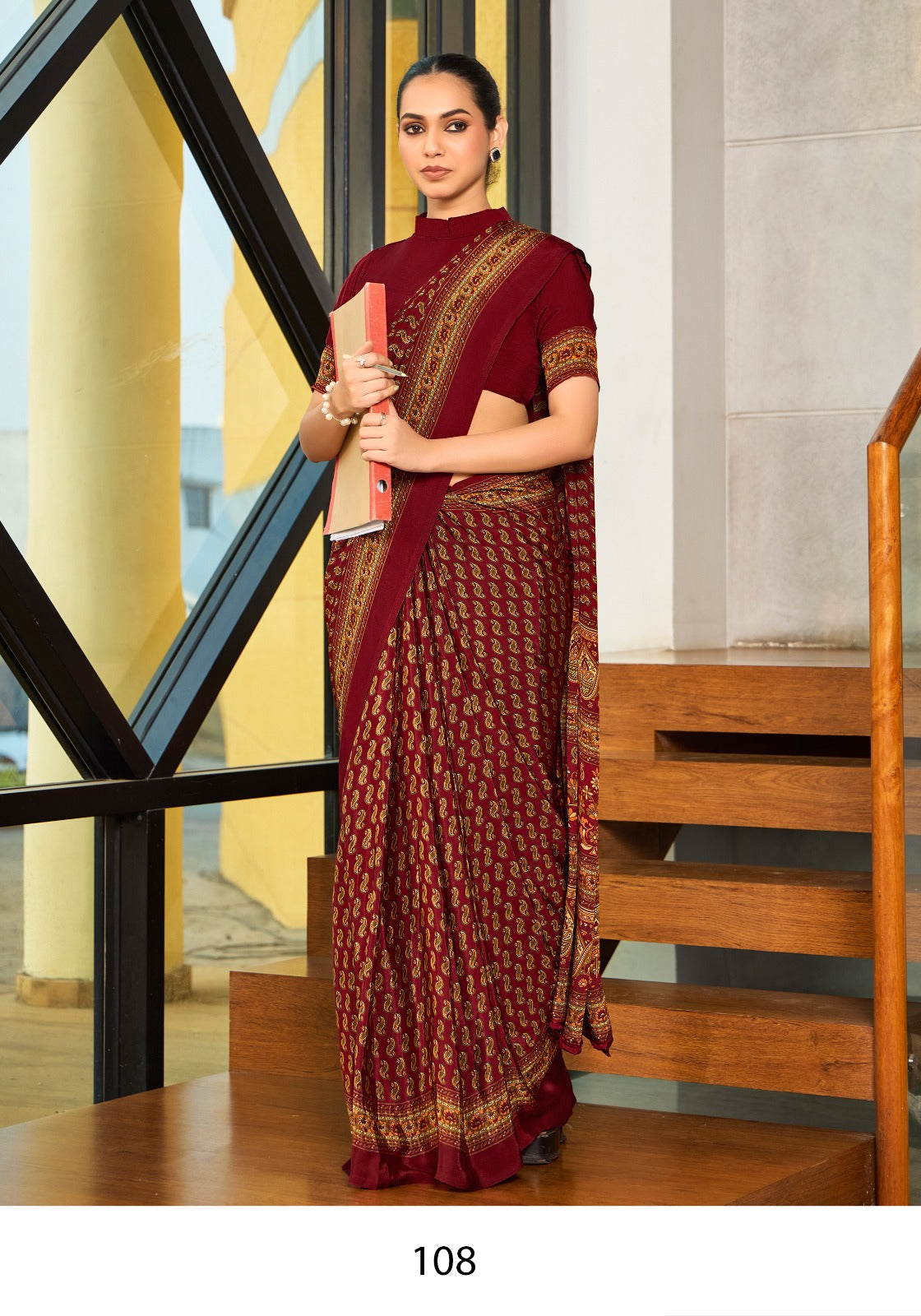maroon crepe silk saree with a floral pattern under 1500