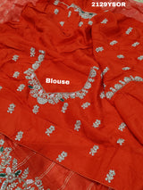 A red saree with silver and gold sequence cutdana work pattern.