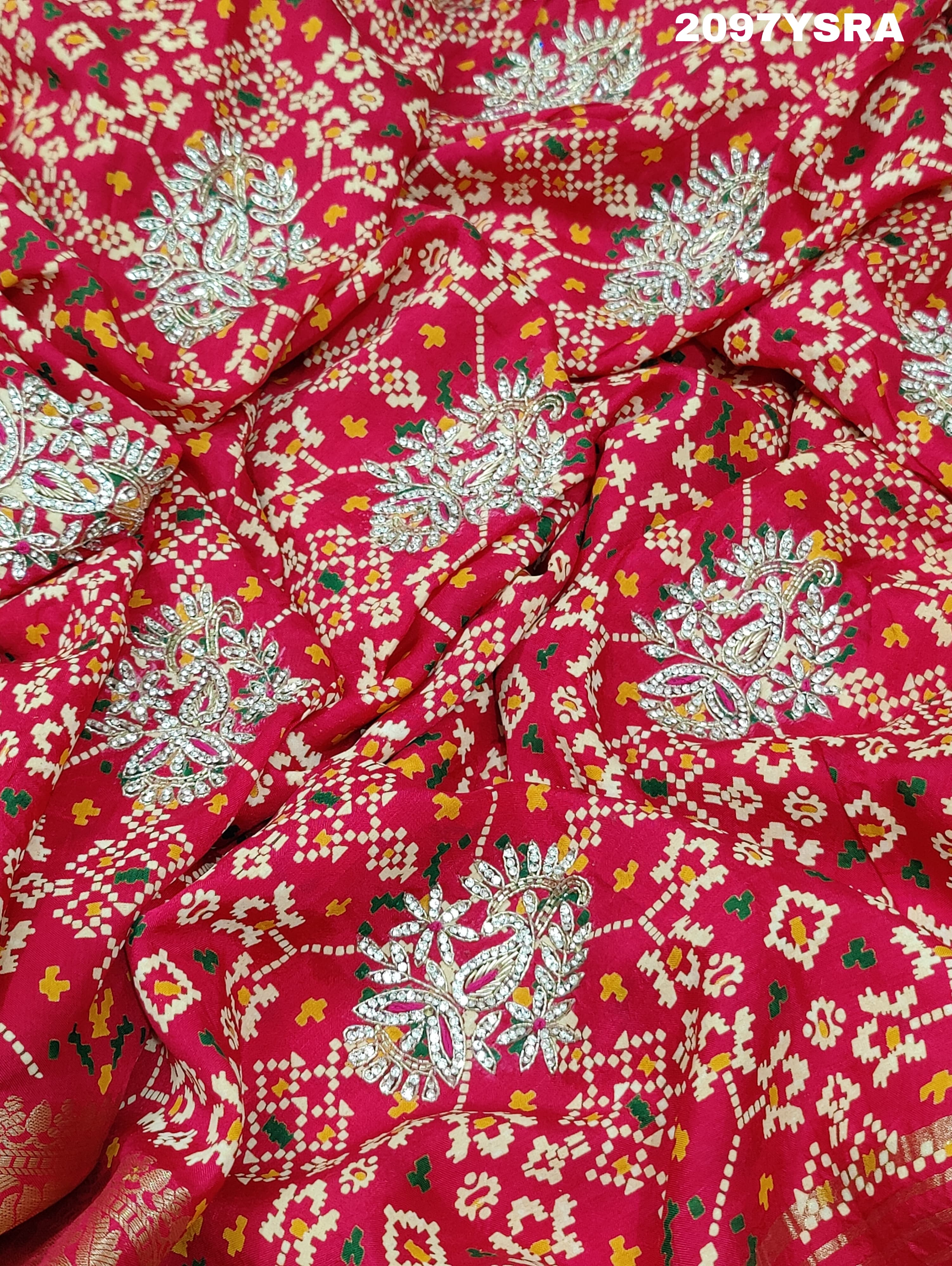 A red and gold Munga silk saree with Zardoji work and patola print style