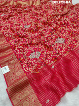A red and gold Munga silk saree with Zardoji work and patola print style