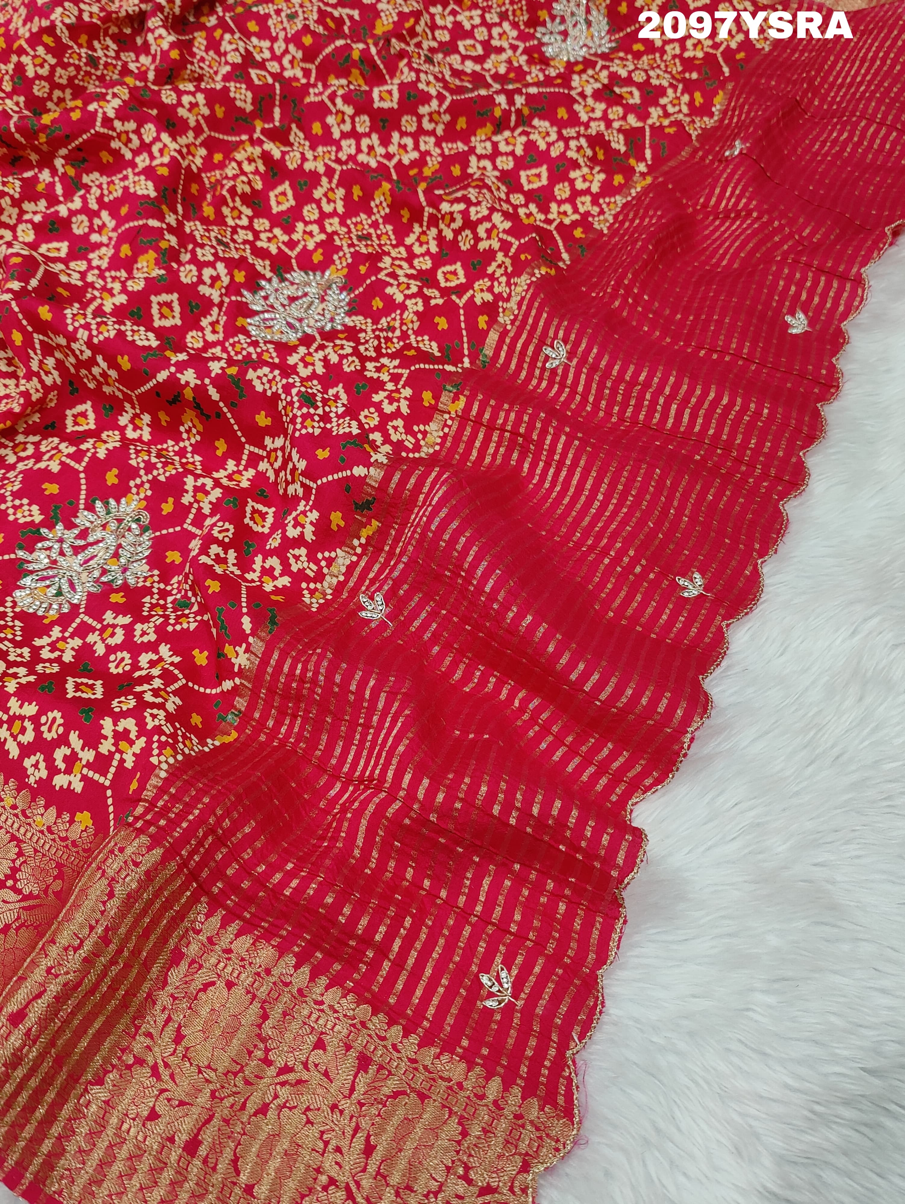 A red and gold Munga silk saree with Zardoji work and patola print style