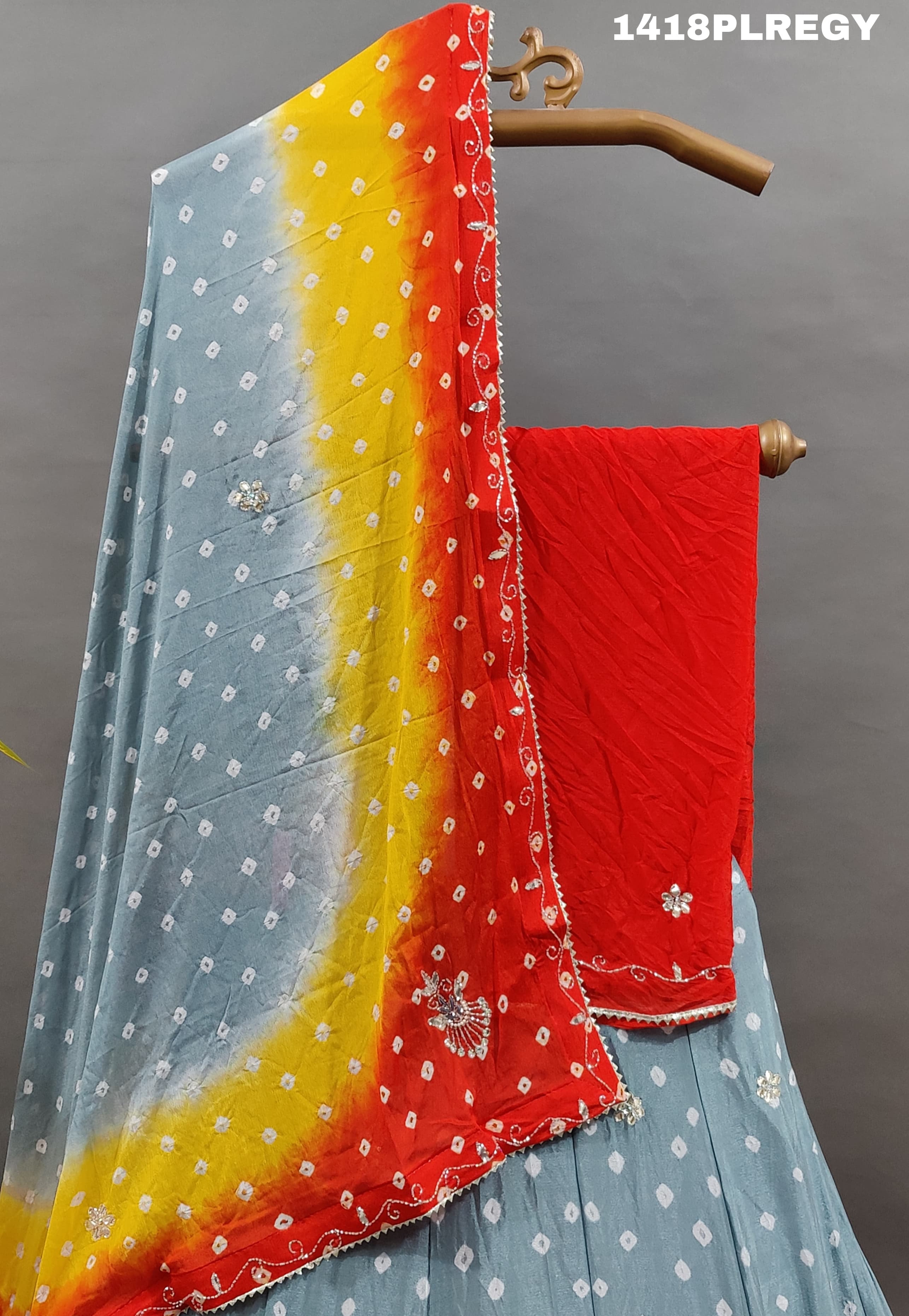 A traditional Indian lehenga with multicolor bandhani