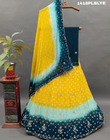 A traditional Indian lehenga with a multicolor bandhani pattern
