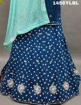 A traditional blue lehenga with bandhani style and cutdana work