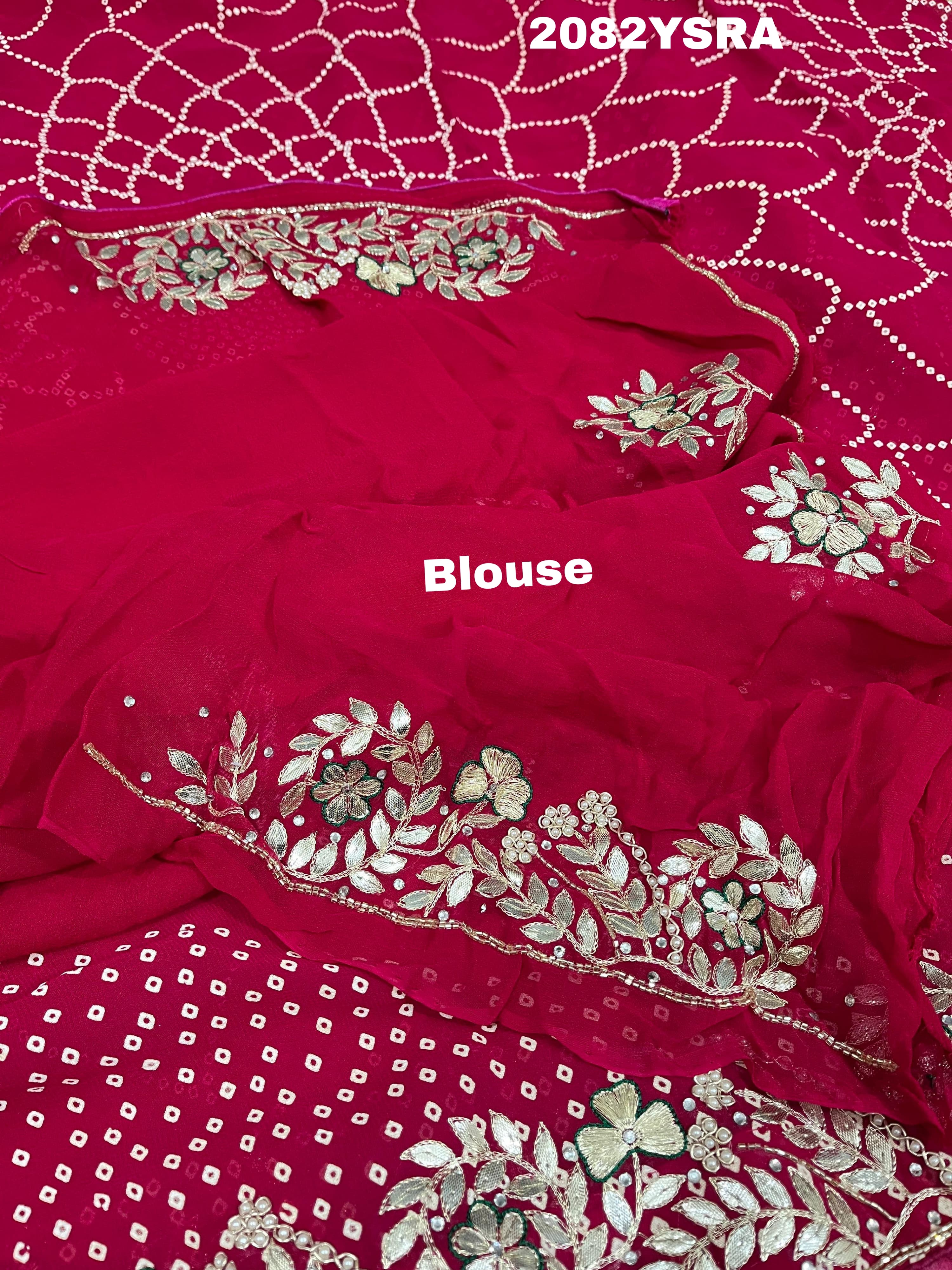 A pink saree with bandhani style dots and gotapatti work