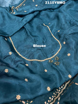 A blue saree with geometric gotapatti work embroidery