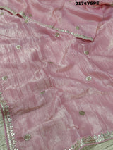 A saree with tissue silk fabric featuring Bollywood style embellishments and gotapatti work in red and pink colour