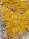Yellow Banarasi silk saree with floral embroidery work