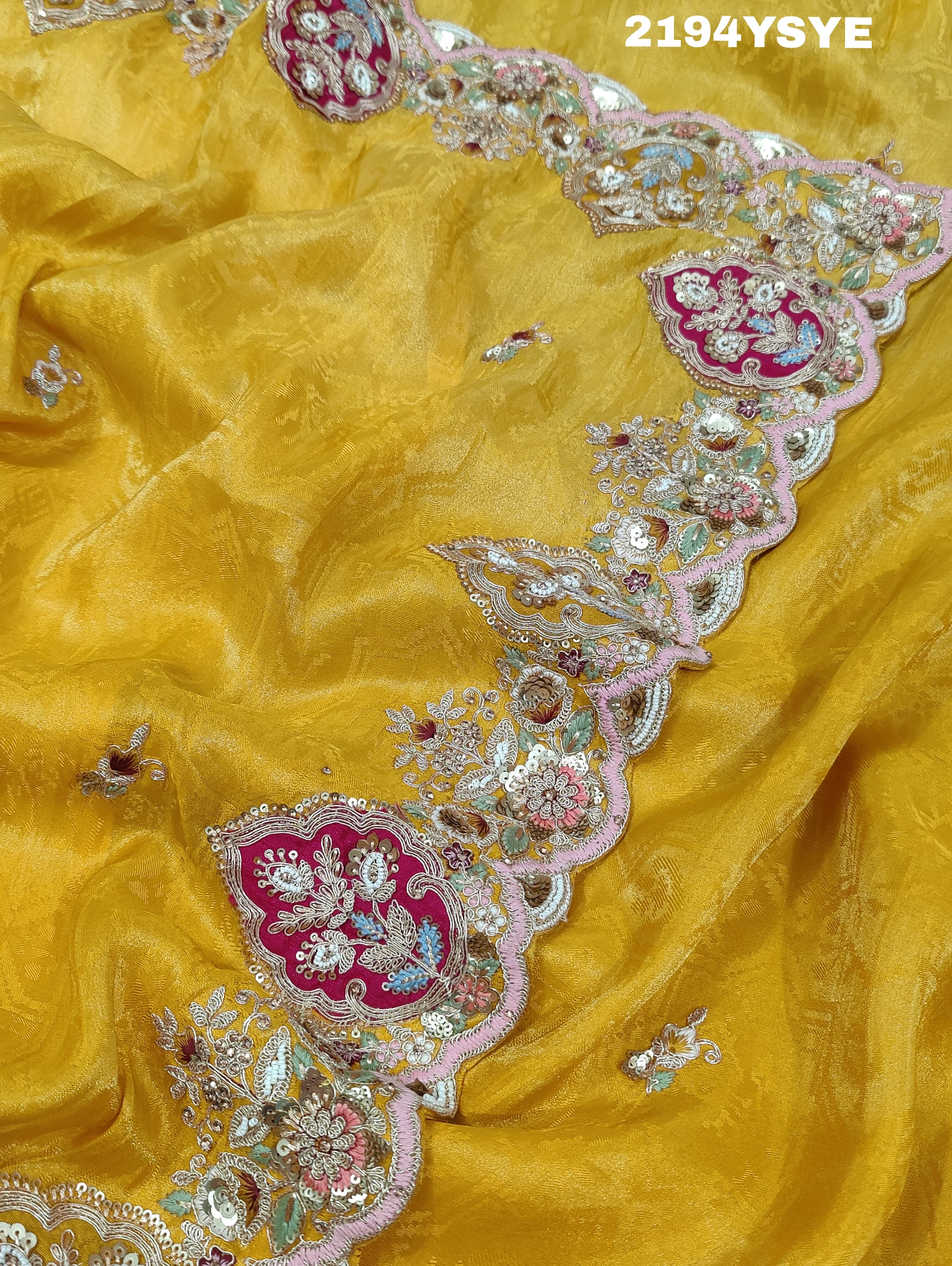 Yellow Banarasi silk saree with floral embroidery work