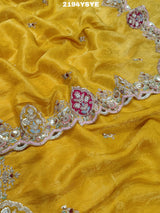 Yellow Banarasi silk saree with floral embroidery work