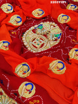 A red and orange Marwadi chunri Pure Ojariya Bel Buti Odhna