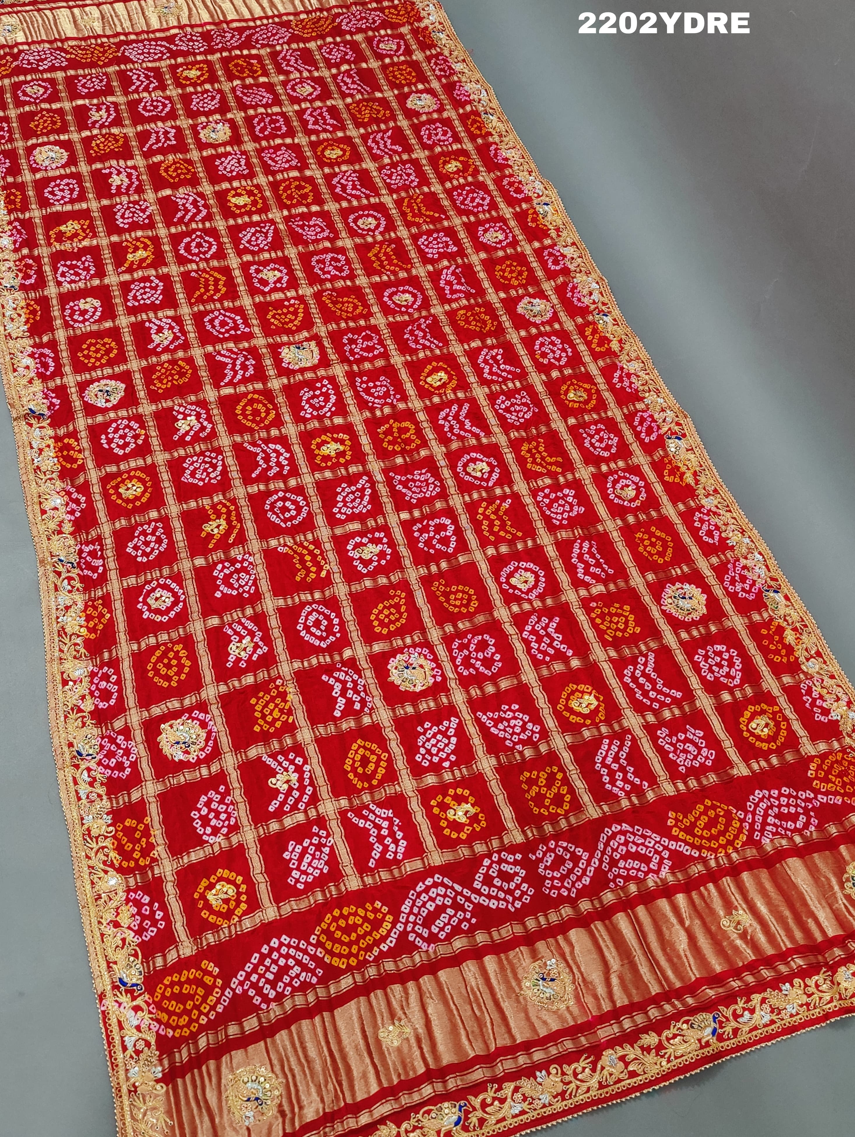 A red and multicolor pure Gaji silk bandhani odhana with zardozi work