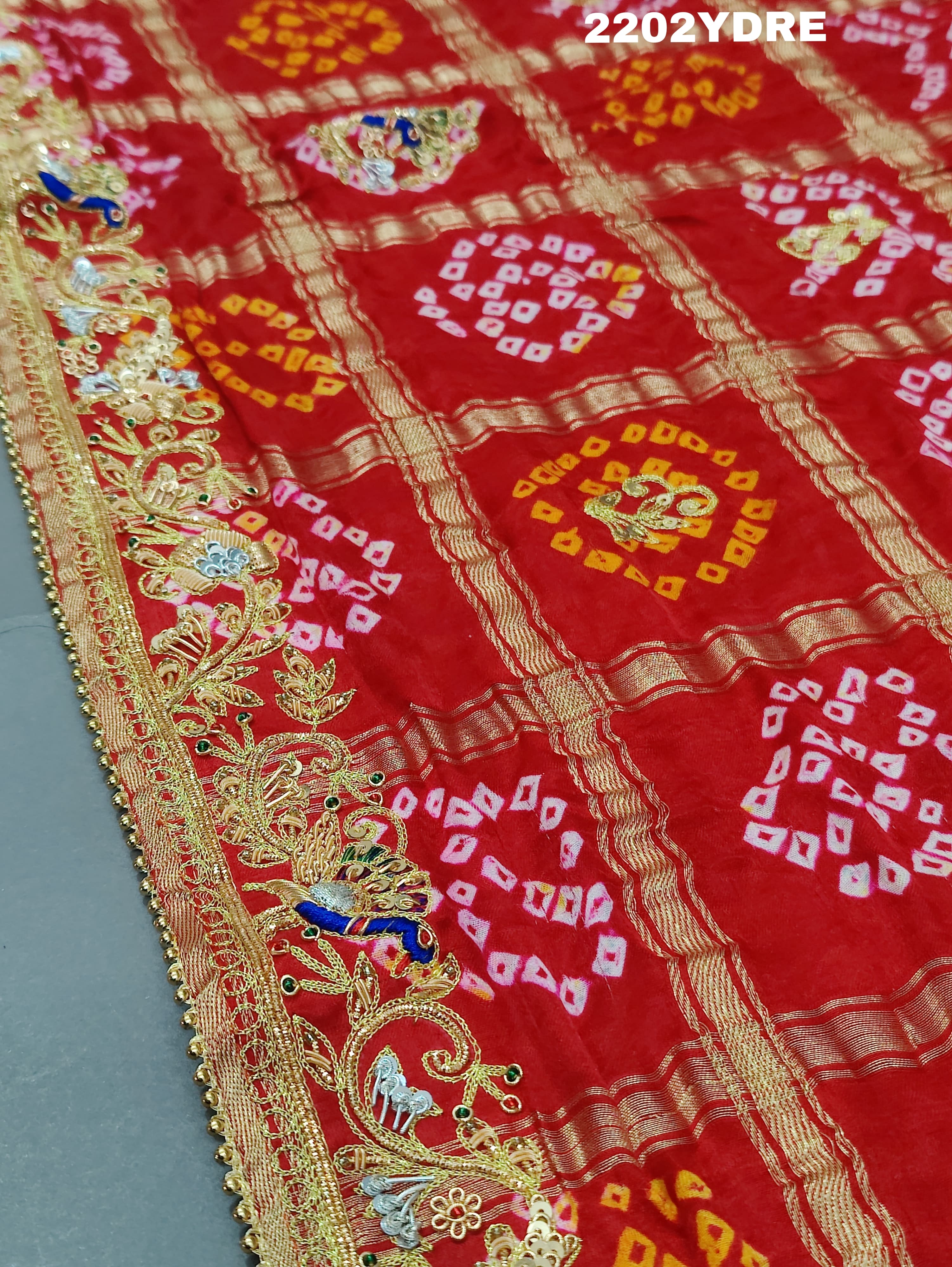 A red and multicolor pure Gaji silk bandhani odhana with zardozi work