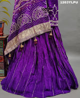 A traditional wear lehenga with bandhani style gotapatti work