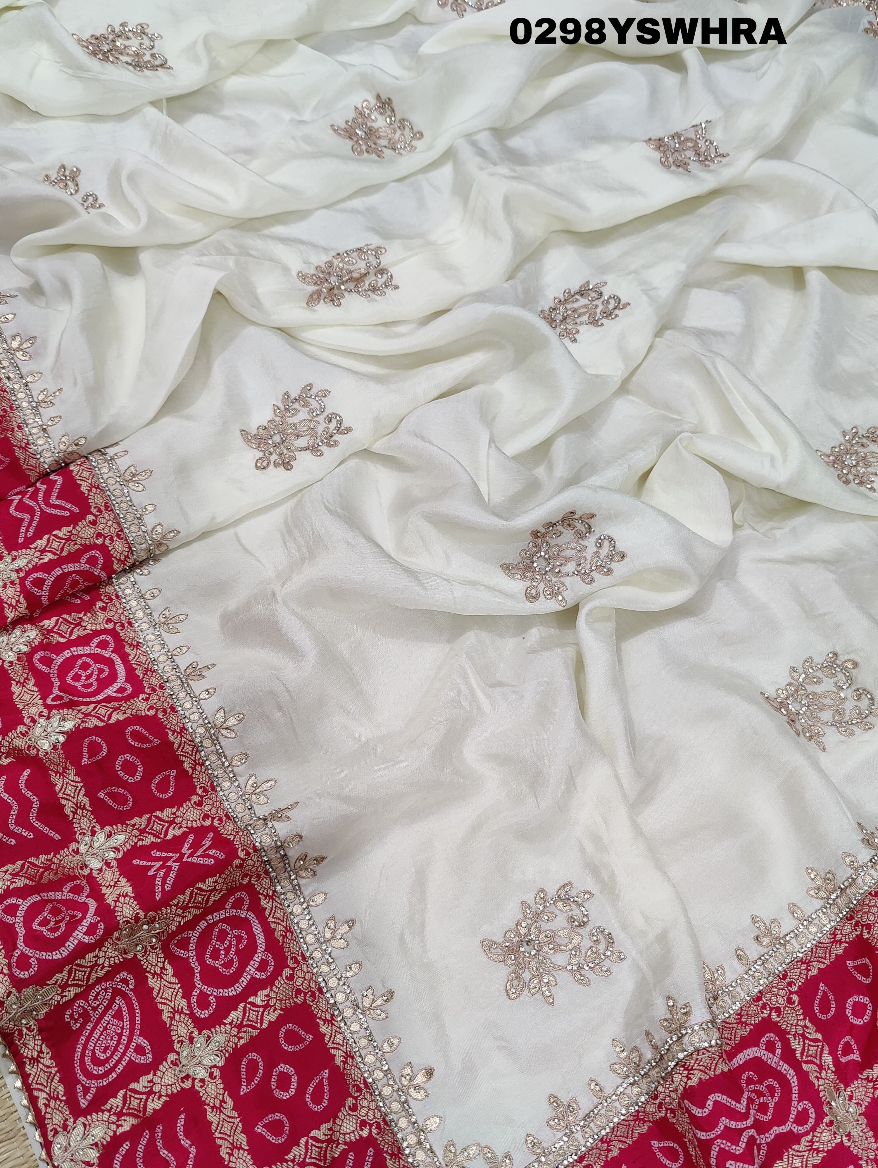 Munga Silk saree with Bandhani style embellishments and Gotapatti work, predominantly pink and white.