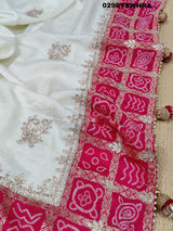 Munga Silk saree with Bandhani style embellishments and Gotapatti work, predominantly pink and white.