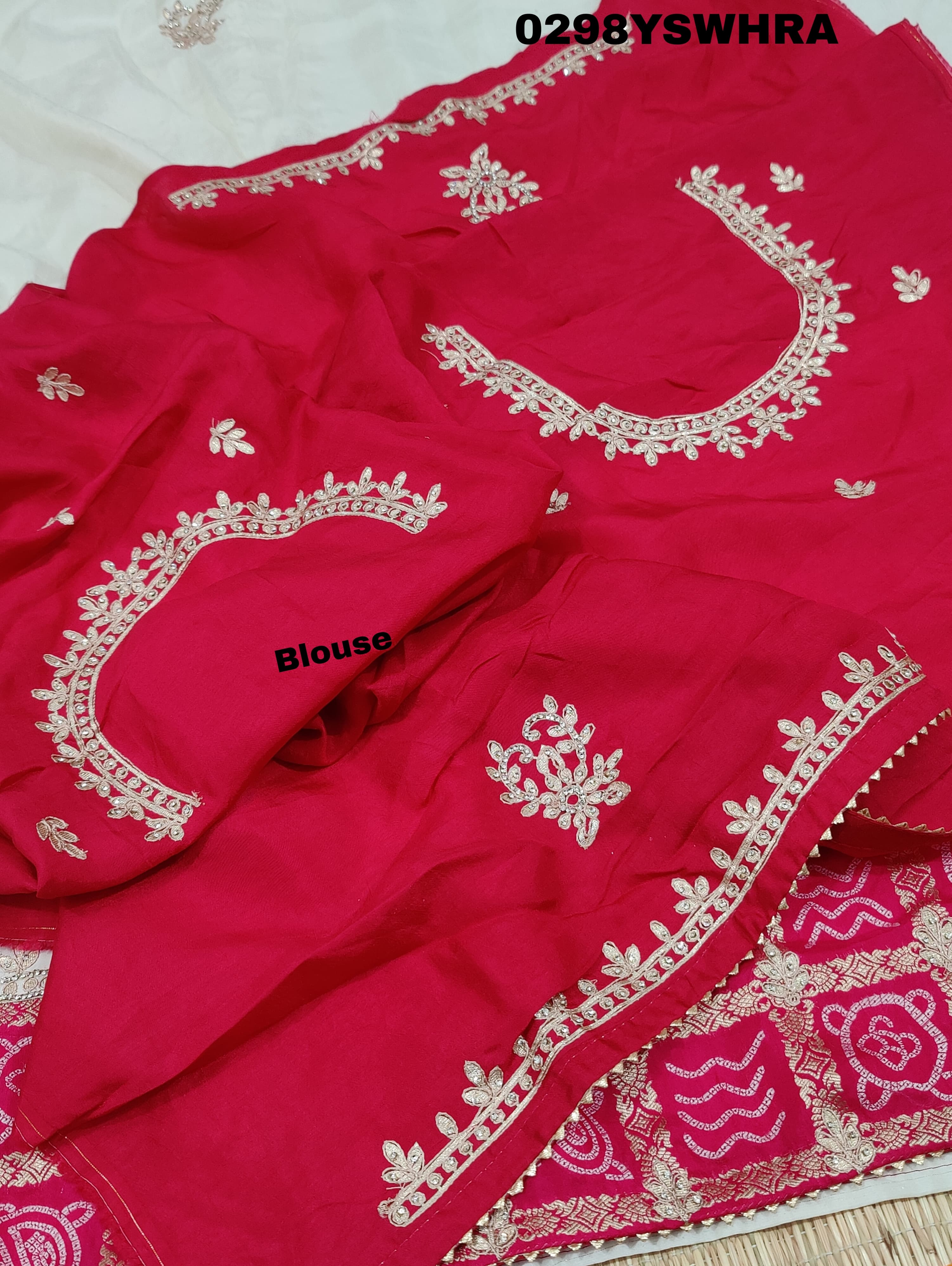 Munga Silk saree with Bandhani style embellishments and Gotapatti work, predominantly pink and white.