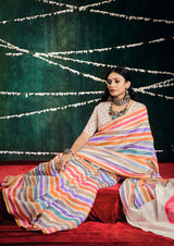 A multicolored cotton silk printed Bollywood saree with a traditional design, featuring stripes and floral patterns