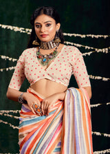 A multicolored cotton silk printed Bollywood saree with a traditional design, featuring stripes and floral patterns